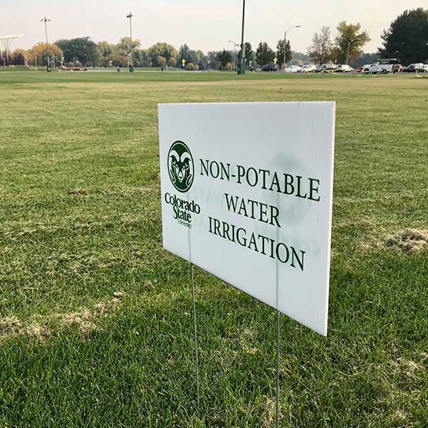sign on turf reads, "non-potable water irrigation"